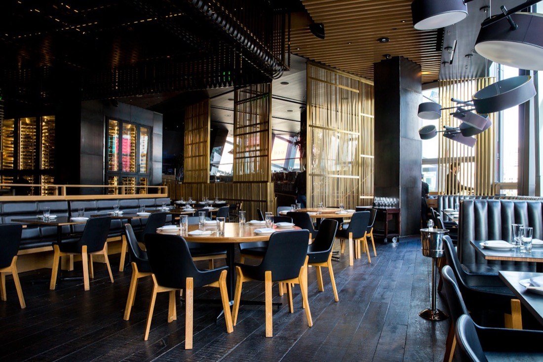 Restaurant dining room set for service